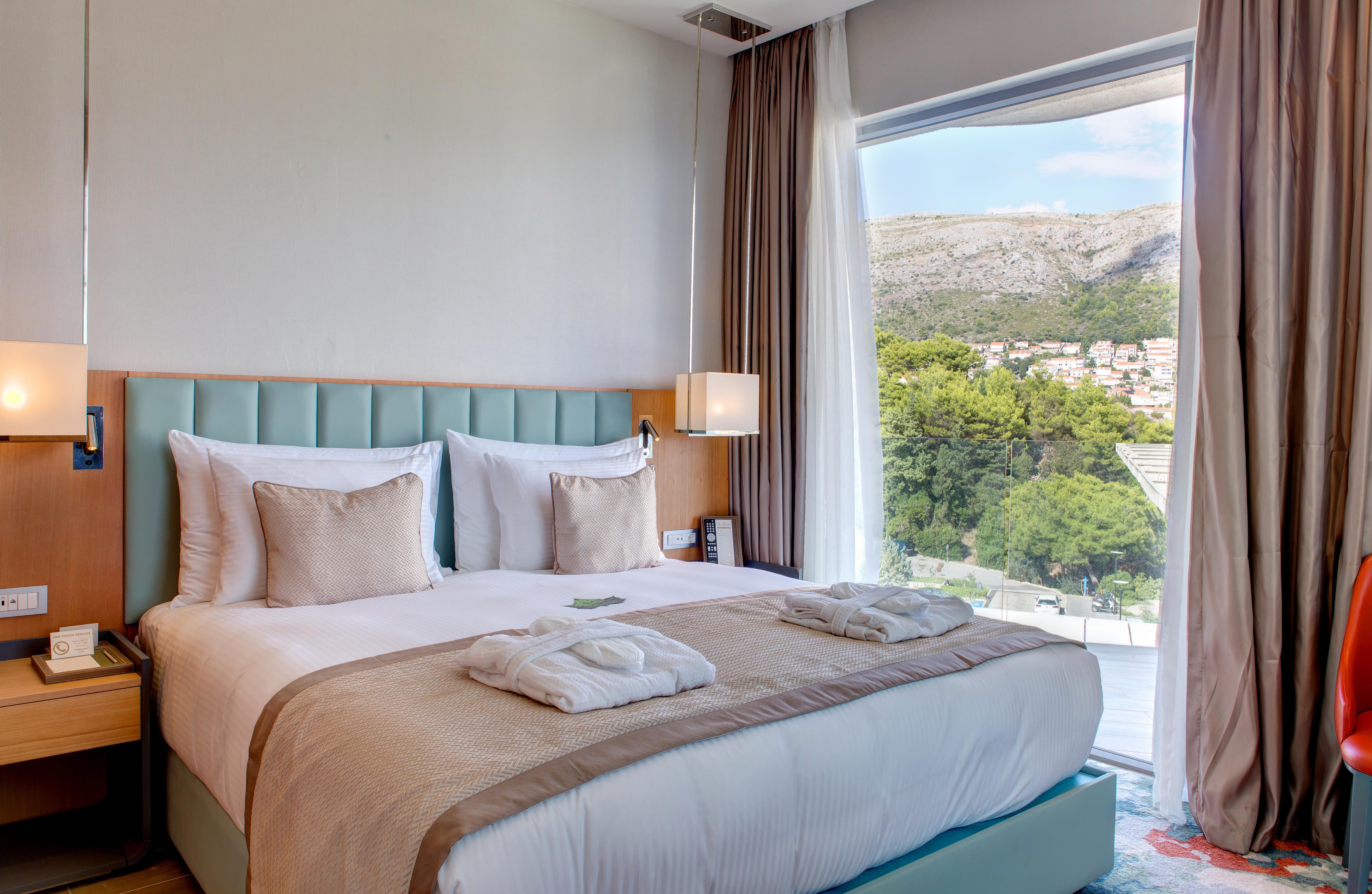فندق ريكسوس بريميوم دبروفينك دوبروفينك المظهر الخارجي الصورة A bedroom at the Athens Hilton